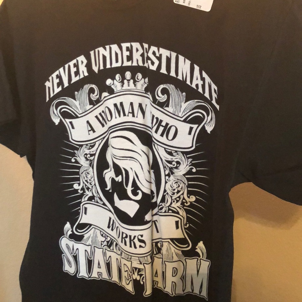 State Farm shirt.